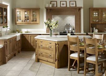 Oak panels and choice of marble and stone worktops. 