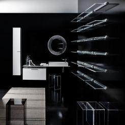 Counter top washbasin, wash top, vanity unit, tall unit, stool, circle mirror and wall mounted shelf. 