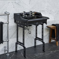 Black wrought iron style basin and stand. 