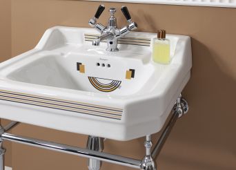 White and colour detail basin with metal stand. 