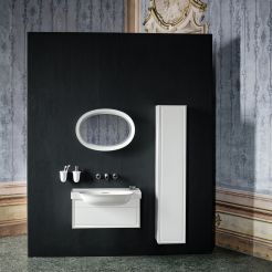 Washbasin with drawer element, tall unit and illuminated oval mirror. 